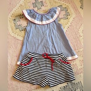 Blue and White Striped Outfit with Red Accents